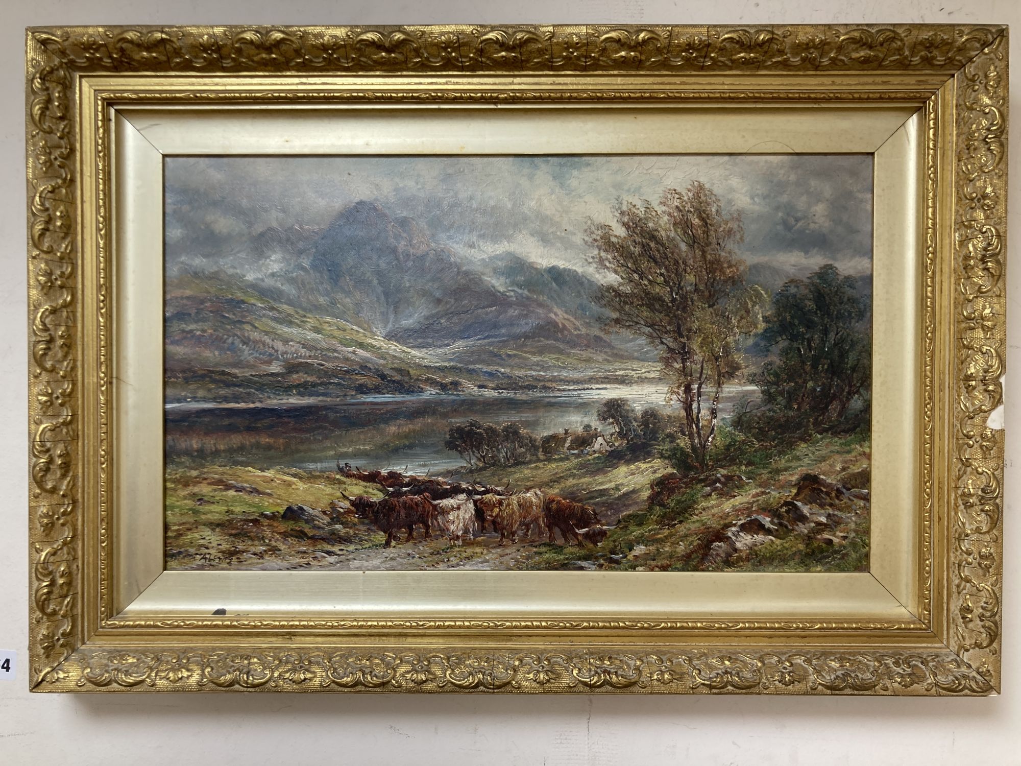 A. Lewis, oil on canvas, Highland cattle beside a loch, signed, 29 x 50cm